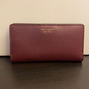 Burgundy wallet by Kate spade